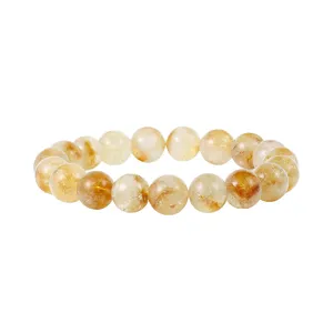 Gedetailleerd overzicht van de natuurlijke citrien kristallen armband met gouden insluitsels.