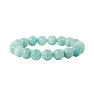 Gedetailleerde opname van blauwgroene edelsteen kralenarmband, gladde ronde kralen, elegante sieraden.