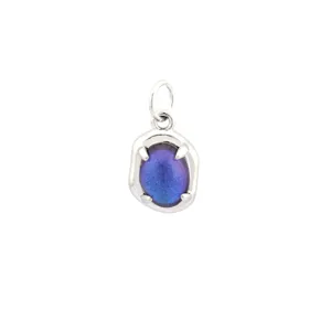 Detailed view of the silver-tone copper pendant featuring a sparkling purple iridescent oval stone.