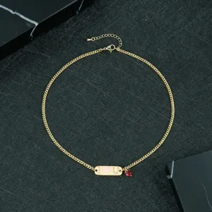 Gold-plated brass necklace with I love U pendant, zirconia pave, and red heart charm.