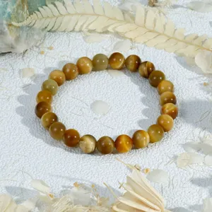 Retro gekleurde tijgeroog edelsteen kralen armband, stijlvol unisex sieradenstuk.