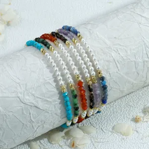 Handmade pearl gemstone beaded stackable bracelet detail shot showing exquisite craftsmanship.
