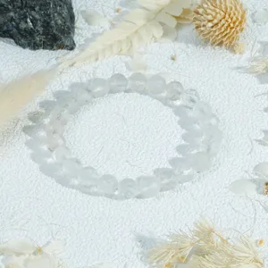 Clear faceted crystal beaded bracelet, elegant white quartz wrist jewelry for women daily wear.