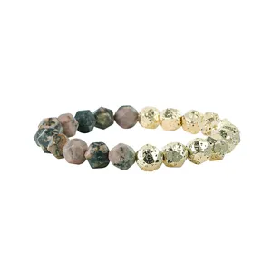Elastische armband van gefacetteerde steen en gouden lavakraal met mooi stijlvol design.