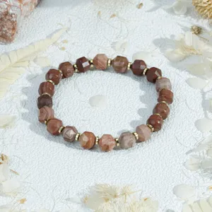Detailed shot of retro faceted gemstone bracelet with metallic spacers, elegant ins style jewelry.