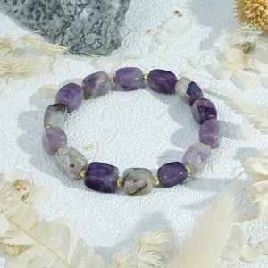 Elegant irregular cube crystal stone bracelet with gold spacer beads, minimalist chic design.