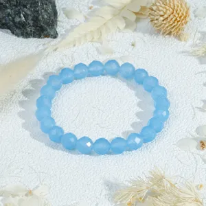 Charming blue faceted crystal bead bracelet detail, elegant polished gemstone jewelry for women.