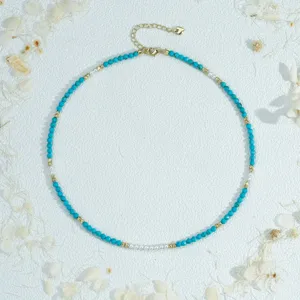 Turquoise beaded necklace with gold metal spacers and pearls, dainty minimalist jewelry gift.