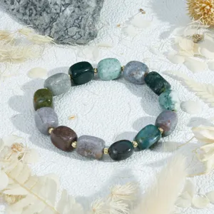 Detail shot of irregular stone block bracelet with gold spacer beads, elegant daily jewelry.