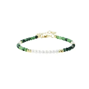 Elegant green stone and pearl beaded bracelet with gold spacers and adjustable chain.