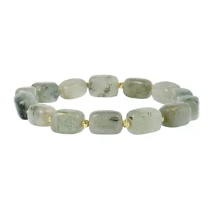 Detail view of irregular block stone beaded bracelet with metallic gold spacer beads.