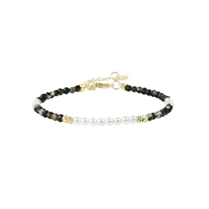 Delicate beaded bracelet featuring mixed pearls, black faceted beads and gold accents.