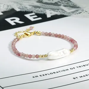 Europees Franse onregelmatige parel en roze kralen armband, niche retro luxe stijl.
