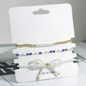 Retro Schleife Perlen Armband Set, schicke stapelbare Handkette für Damen im Alltag.