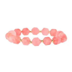 Elegante gefacetteerde roze edelsteen kraal armband met gouden afstandskralen voor dames mode.