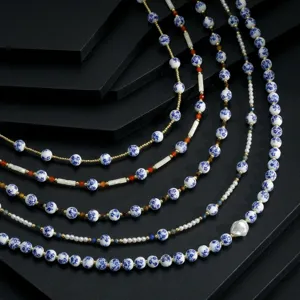 Close-up detail of new Chinese style blue and white porcelain bead and pearl layered necklace.