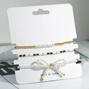 Elegantes dreiteiliges Perlen Schleifen Perlenarmband Set, retro mehrlagiger Schmuck.