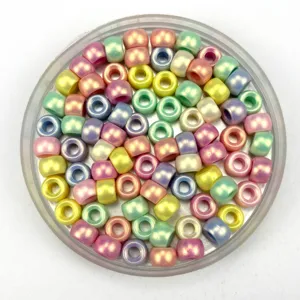 Pearl finish acrylic barrel beads detail shot, colorful DIY craft spacer beads for jewelry making.