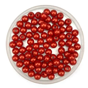 Red imitation pearl beads close-up detail for DIY jewelry accessories making and bag decoration crafts