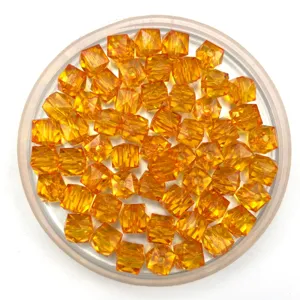 Orange faceted acrylic square beads detail, perfect for DIY handmade jewelry crafts and bead weaving.