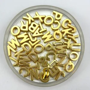 Gold metal alphabet letter charms beads for DIY jewelry making and handmade accessories.