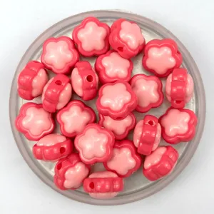 Detail view of pink acrylic flower beads, perfect for DIY jewelry making, keychains and phone straps.