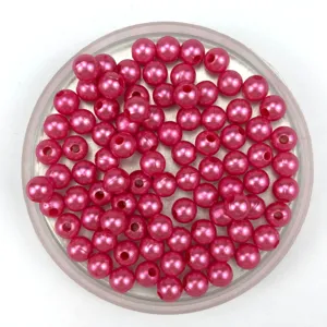 Pink ABS imitation pearl beads detail shot, glossy finish for DIY jewelry crafting.