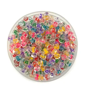 Colorful transparent acrylic alphabet letter beads in container for DIY jewelry making crafts.
