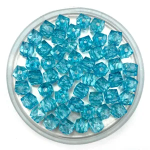 Transparent blue faceted acrylic cube beads close-up detail for DIY handmade crafts and jewelry.