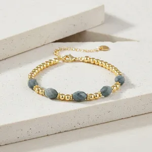Retro kraal armband met gouden metalen kralen en grijze halfedelstenen voor dagelijkse stijl.