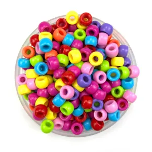 Acrylic macaron round large hole pony beads detail shot, vibrant mixed colors for DIY jewelry crafts.