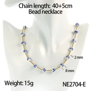 Blue and white porcelain bead necklace with gold spacer beads, delicate clavicle chain style.