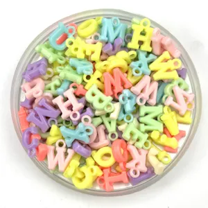 Pastel plastic letter charms and beads, colorful DIY jewelry making accessories for kids crafts.