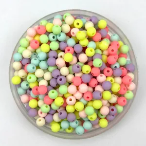 Colorful plastic round beads for DIY jewelry making crafts, bulk assorted pastel colors.
