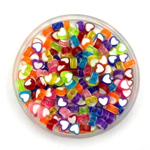 Transparent mixed color heart beads detail view, colorful DIY bracelet jewelry making accessories.