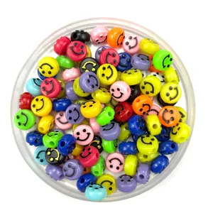 Colorful plastic smiley face beads bulk mix for DIY jewelry making and craft projects.