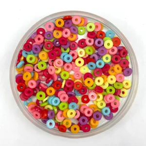 Colorful polymer clay round flat spacer beads for phone case DIY decoration details.