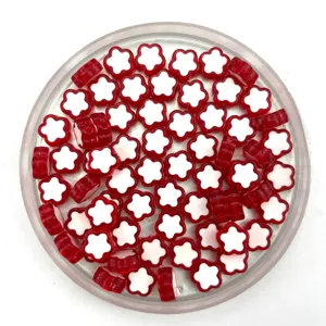 Red and white acrylic flower beads detail closeup, ideal for DIY jewelry making spacer