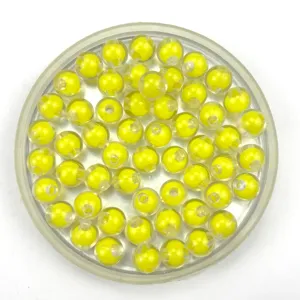 Perles rondes transparentes pour loisirs créatifs vue détaillée sphères jaunes