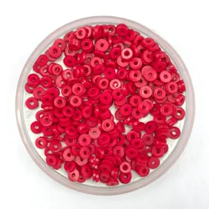 Red flat round spacer beads detail shot, perfect for DIY phone case and jewelry accessories.