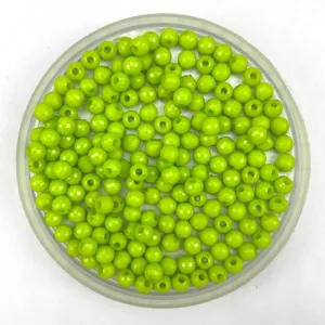 Close-up of vibrant lime green faceted acrylic round beads, perfect for DIY jewelry and crafts.