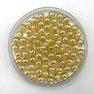 Close-up detail of transparent AB iridescent acrylic round beads for DIY jewelry crafts.