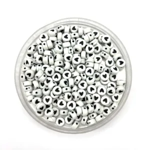 Acrylic white heart beads detail shot, ideal for DIY handmade bracelets and jewelry accessories.