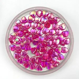 Acrylic pink iridescent heart beads detail view, perfect for handmade DIY jewelry making items.