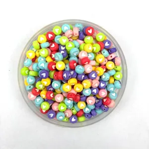 Colorful acrylic heart shaped beads for DIY jewelry making and handmade bracelets accessories.