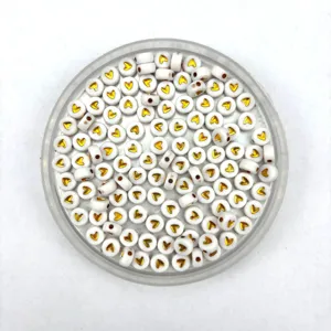 White flat round acrylic beads featuring gold heart pattern for DIY handmade bracelets jewelry.