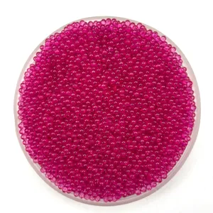 Close-up of 2-2.5mm solid color plastic micro beads candy pink acrylic craft beads tray