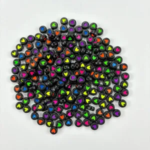 Acrylic black round beads with colorful heart patterns for DIY handmade bracelets.