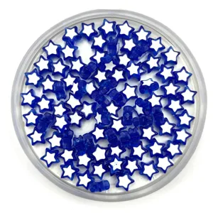 Close up detail of blue and white acrylic star shaped loose beads for DIY craft jewelry making.