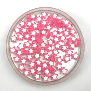 Close-up of pink acrylic star beads for DIY jewelry making accessories, transparent design.